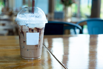 Iced mocha coffee with shower chocolate sauce in glass.