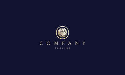 Vector logo on which an elegant image of gold leaves in a circle.