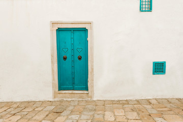 An image from Santorini of some of the homes that adorn the island in the village of kamari