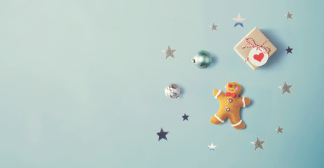 Christmas gingerbread with ornaments - overhead view flat lay