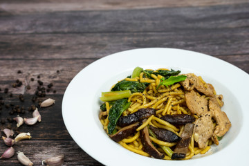 Chinese stir-fried noodles, Shiitake mushrooms, Pork and Cantonese vegetables, Hokkien noodles, Phuket's traditional food.
