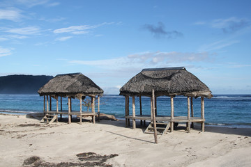 Beach fale, a simple open 'hut' (faleo'o Samoan language), popular in budget eco-tourism in Samoa. Beautiful day fale at Lalomanu Beach © peacefoo