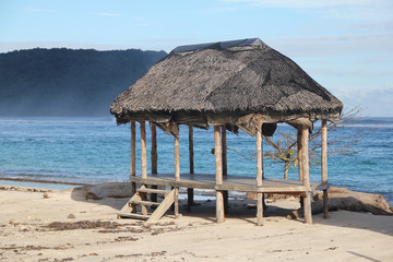Beach fale, a simple open 'hut' (faleo'o Samoan language), popular in budget eco-tourism in Samoa. Beautiful day fale at Lalomanu Beach © peacefoo
