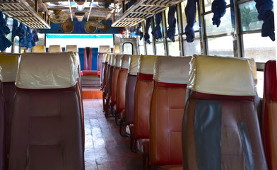 The seat inside the old bus In the countryside of Thailand
