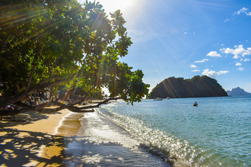 Sunny day at the tropical beach with a blue water in the Philippines © Konrad
