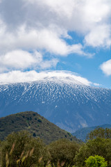 View on dangerous active stratovolcano Mount Etna on east coast of island Sicily, Italy