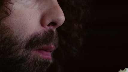 Close-up, man eats, fast food, doner kebab, pita, shawarma.