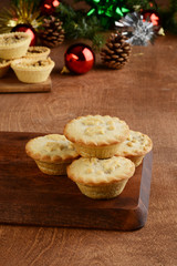 christmas mincemeat pies with tarts in background
