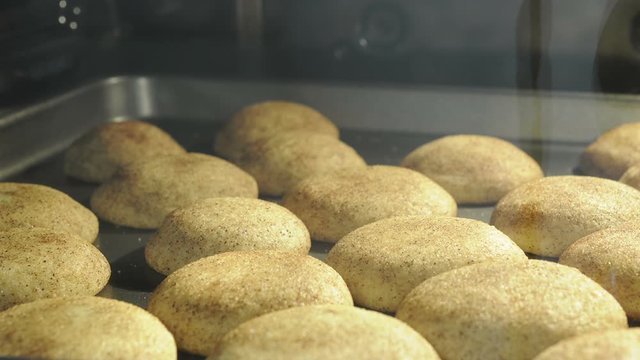 Snickerdoodle cinnamon sugar cookies baking in the oven time lapse