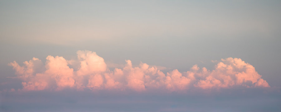 Cumulus clouds at sunset