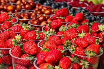Strawberries inside plastic cups.  Fruit concept image. 