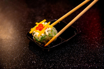Rice Sushi is a lump of meat and eaten with sauce is a popular dish in Thailand