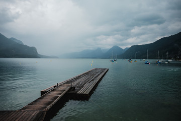 Beautiful pier at Wolfgangsee lake in Austria. Wolfgangsee is one of the best known lakes in the Salzkammergut resort region of Austria.