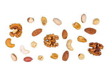 Fototapeta na wymiar Various nuts (almond, cashew, hazelnut, pistachio, walnut) isolated on a white background. Vegetarian meal. Healthy eating concept