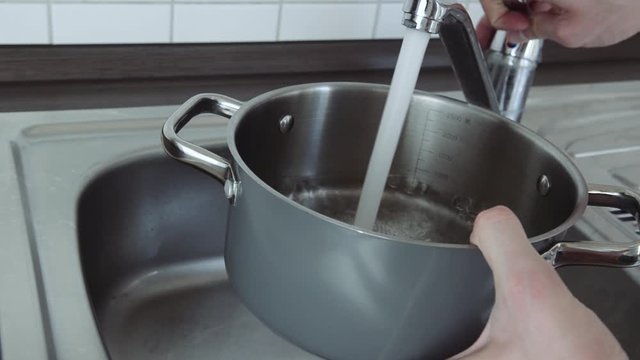 fill the pot full of water in the sink to start preparing food