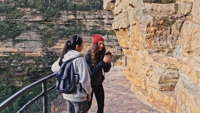 Two Young Female Tourist Taking Selfie For Social Networks on Trail in Scenic Blue Mountains National Park, Australia, 120fps Slow Motion