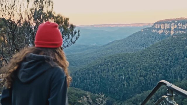 Female Hiker With Red Cap Approaching Viewpoint in Blue Mountains National Park Australia, Cinematic Slow Motion