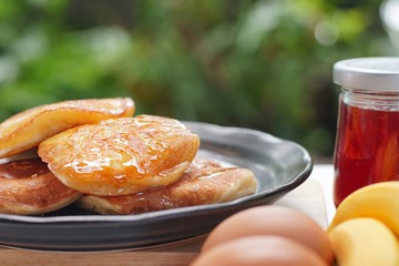 Pancakes served honey on table, healthy breakfast for everyday. Clean food good taste for advertising ideas concept. 