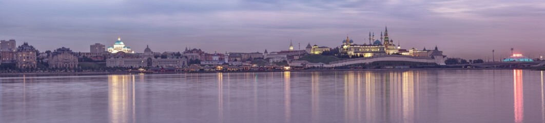 Kazan, Russia. View of the Kazan Kremlin with Presidential Palace, Soyembika Tower, Annunciation Cathedral and Qolsharif Mosque from Kazanka River at evening. Big size photography, long exposure.