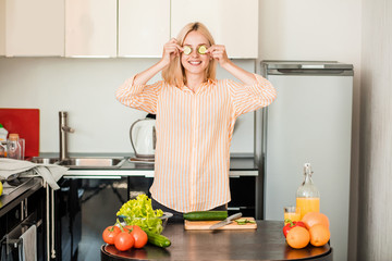Young woman cooking in the kitchen