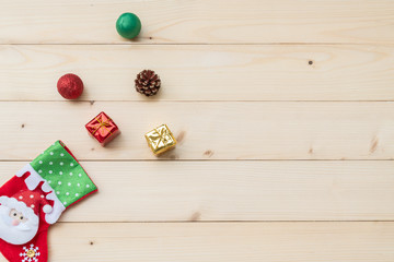 Flat lay composition with Christmas decor on wooden background, copy space for text, top view