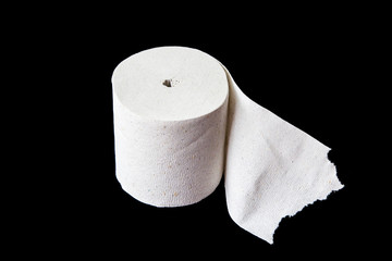 Toilet paper on black background