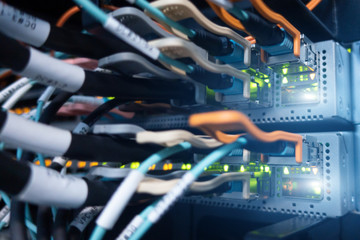 Telecommunication concept. Modern Server Room Environment. Many cables