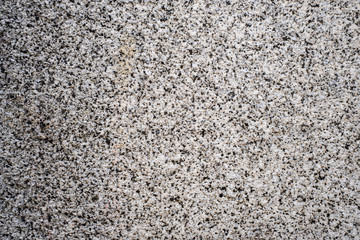 Rough granite or stone surface - background or texture