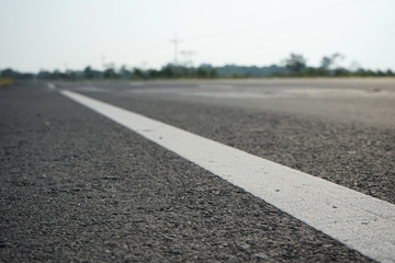 Fototapeta premium Road traffic paint White on the asphalt surface