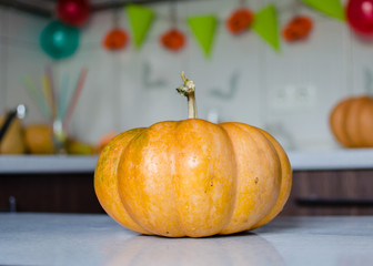 Carved pumpkins into jack-o-lanterns for halloween, decoration and holidays concept