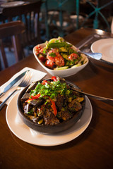 Georgia. Tomato and cucumber salad with nuts and meat