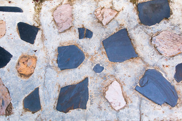 Blue stone on the floor pavement  cobblestones bricks background.