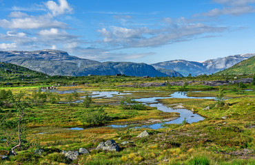 Fototapeta na wymiar Mountain tundra lakes landscape, Norway, Odda, way to Trolltunga rock.