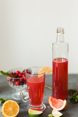 Citrus and lemonade on the table in summer