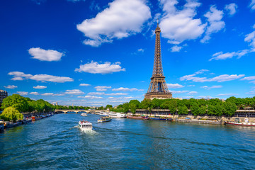 Naklejka na ściany i meble Paris Eiffel Tower and river Seine in Paris, France. Eiffel Tower is one of the most iconic landmarks of Paris. Cityscape of Paris
