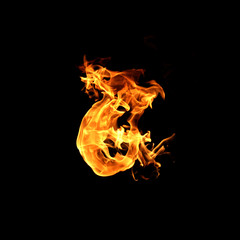 Fototapeta premium Fire flames on a black background.