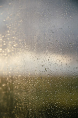 Naklejka na ściany i meble drops of water on windows glass