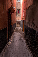 Close up view on a narrow street in the medina. Marrakech, Morocco.