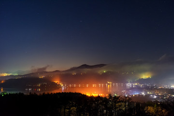 Lake Yamanaka with stars at night