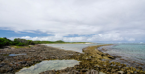 La Pointe des Chateaux Castles headland is a peninsula that extends into the Atlantic Ocean from...