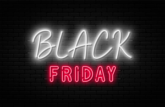 Black Friday sale. Black Friday neon sign on brick wall background. Glowing white and red neon text for advertising and promotion. Banner and background, brochure and flyer design concept