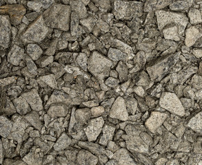 Vue gros plan d'une texture de pierre et rocher gris clair et foncé