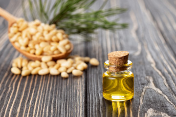 cedar oil in glass bottle