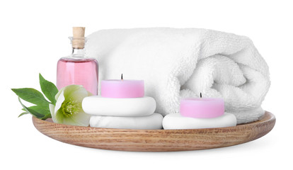 Obraz na płótnie Canvas Tray with towel and spa supplies isolated on white