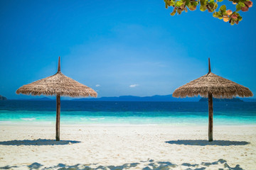 Umbrella wooden on tropical beach.