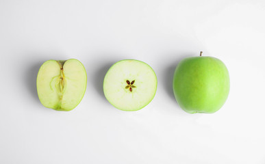 Fresh ripe green apples on white background, top view