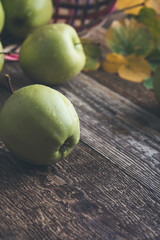 Fresh ripe  green apples In wicker  basket