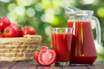 tomato juice in glass and jug