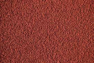 Stadium red rubber treadmill texture