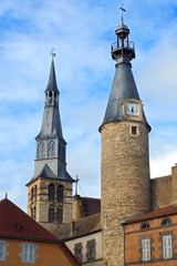 Bell tower of the Sainte Croix church and clock tower of the city of Saint Pourçain sur Sioule, in the department of Allier, in the Auvergne region, in central France